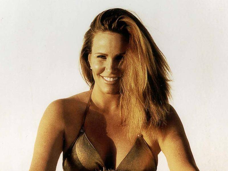 Tawny Kitaen became the rock world's "video vixen" after appearing on album covers and in videos.