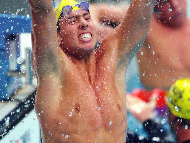 An elated Grant Hackett after dethroning Kieren Perkins in the 1500m freestyle at Sydney 2000.