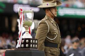 A sold-out crowd will watch the Dragons and Roosters play for the NRL's Anzac Day Cup. (Mark Evans/AAP PHOTOS)