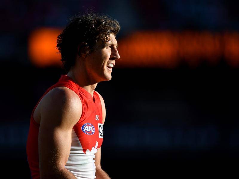 Kurt Tippett will work on a part-time basis as part of AFL side Gold Coast's coaching staff.