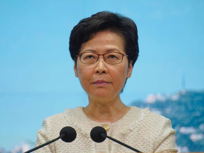 HK leader Carrie Lam says journalists can report freely if they do not violate the new security law.