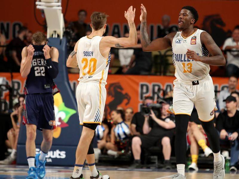 Lamar Patterson (R) celebrates against the 36ers after guiding Brisbane to two NBL wins in round 17.