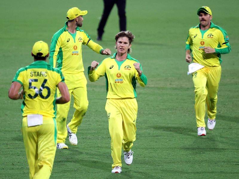 Adam Zampa (c) says the slow over-rate will improve as players get back in the swing of things.