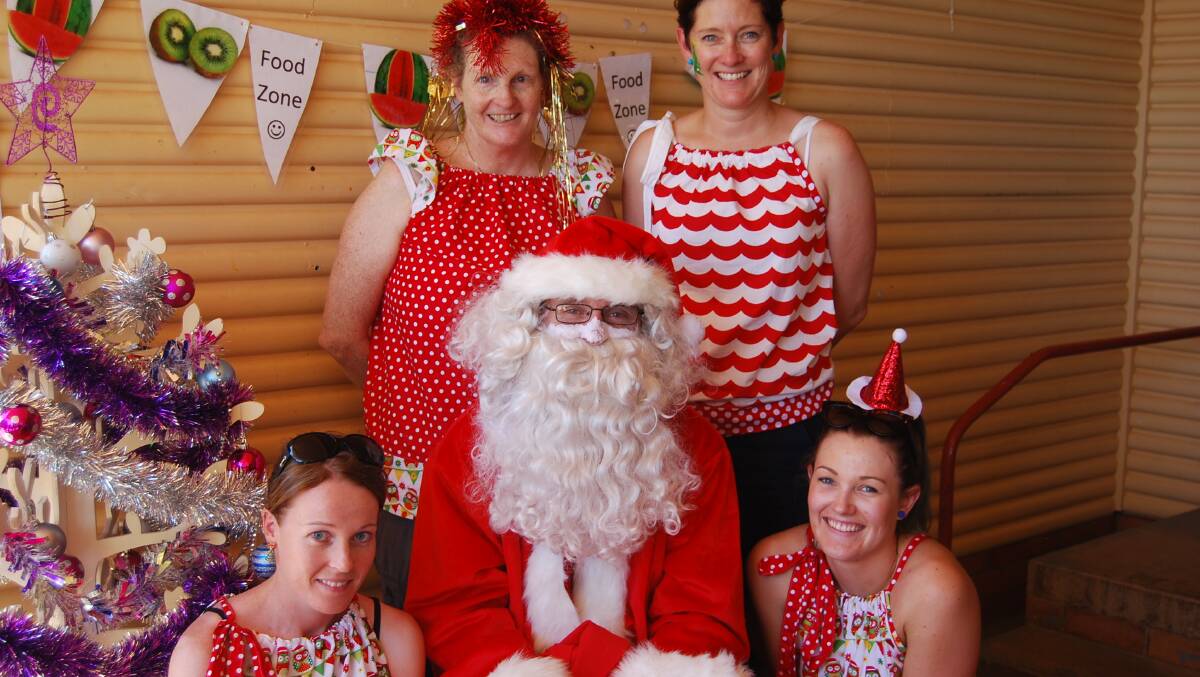 o BBM staff  Roslyn Miller, Nichole Jenkins, Jesse Leek and Rani Dunn with Santa, these girls do an amazing job and really enjoyed their Christmas party with all the children. 