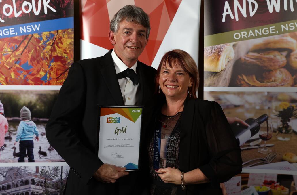 CELEBRATION: Manera Heights Apartments owners Trevor and Joanne Kratzmann scored gold in the self-contained accommodation category in the regional round last year. Photo: CONTRIBUTED